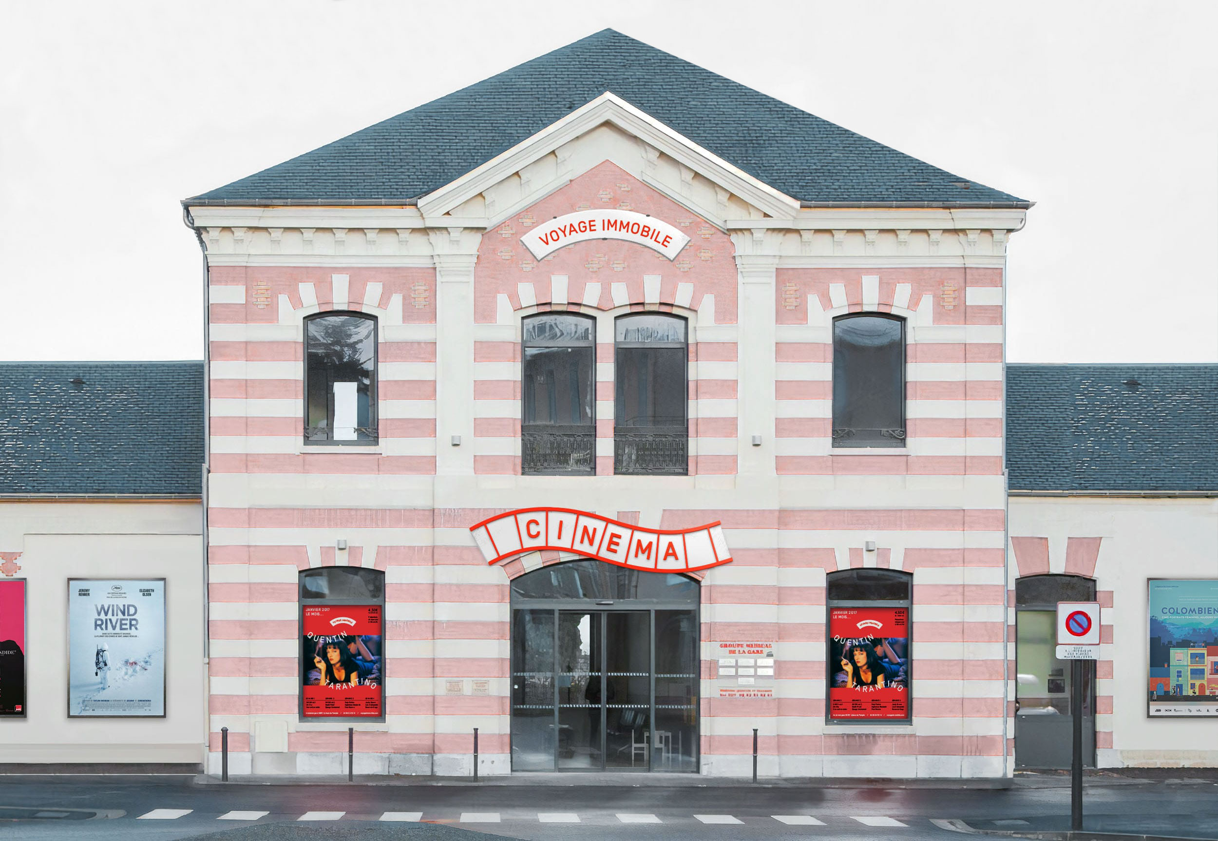 Entrée du cinéma « Voyage immobile », dans une ancienne gare reconvertie.